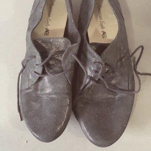 Sparkly black lace-up shoes